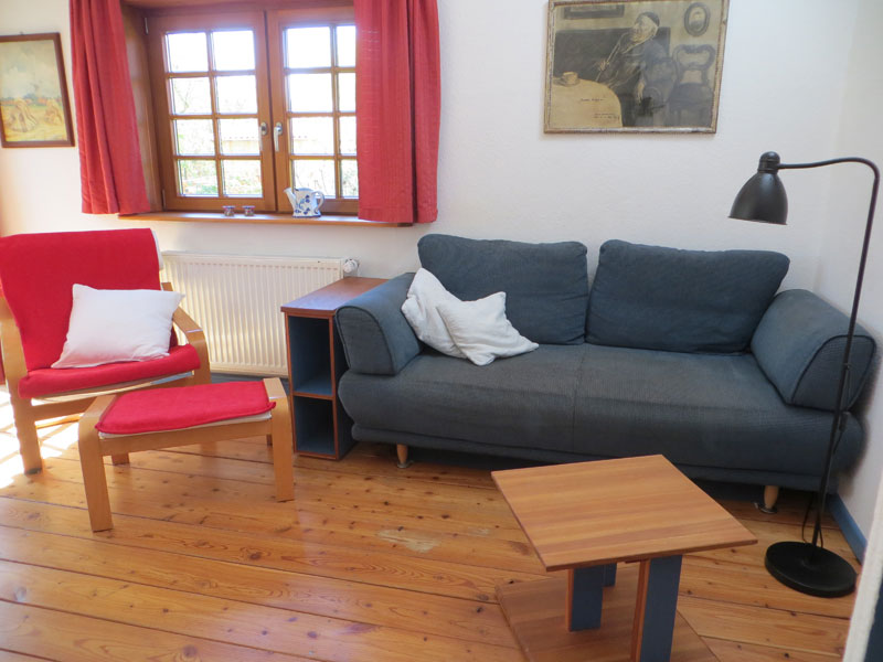 Ferienhaus auf Spiekeroog - Gemütliche Sitzecke im Wohnzimmer